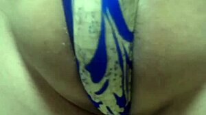 Gorgeous gold leotard babe endures long anal plug training