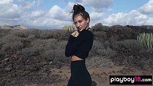 gorgeous brunette taya vais strips naked revealing perfect natural tits desert