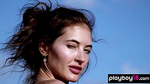 gorgeous brunette taya vais strips naked revealing perfect natural tits desert