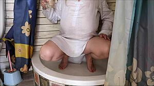 Dirty busty granny Mariaold squirts pee all over herself