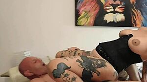 They slide deep into her ass from behind bent over doggystyle