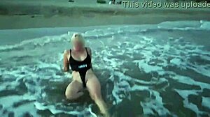 wanna see blonde flash tits suck cock on public beach?