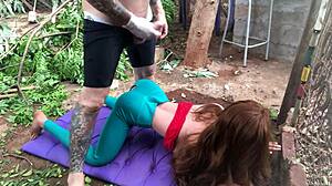 shoving my fist deep into her tight sex doll ass outdoors