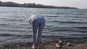 blonde beauty slurps cock by river till cum floods her mouth.