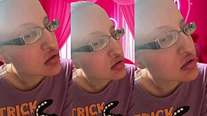 ASMR artist bursts bubblegum bubbles for headphone listeners with glasses