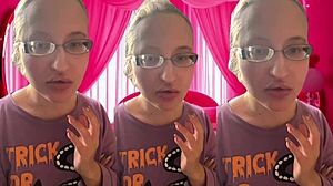 ASMR artist bursts bubblegum bubbles for headphone listeners with glasses