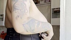 blonde bombshell slips into lingerie flaunting her massive natural tits