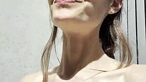 Bikini milf close up moans through oiled vibrator orgasm