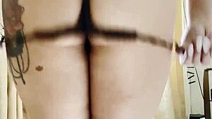 blonde bombshell slips into lingerie flaunting her massive natural tits