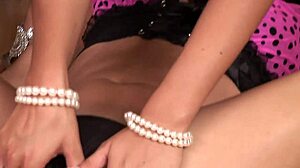 Lesbian babes kiss lick pussies scissor with toys tattooed natural tits