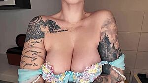 Sexy Redhead in Latex Shows Off Big Tits and Ass