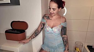 Sexy Redhead in Latex Shows Off Big Tits and Ass