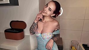 Sexy Redhead in Latex Shows Off Big Tits and Ass