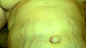 Thick milf's big tits bounce as she gets foot fucked hard by fetish lover.