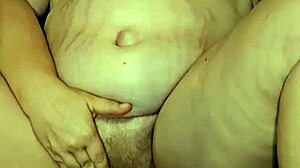 Thick milf's big tits bounce as she gets foot fucked hard by fetish lover.