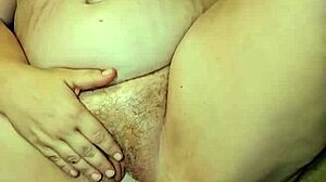 Thick milf's big tits bounce as she gets foot fucked hard by fetish lover.