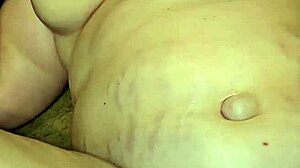 Thick milf's big tits bounce as she gets foot fucked hard by fetish lover.