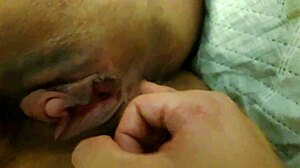 Greedy housewife gives naughty blowjob while fingering wet hairy pussy and big clit close up