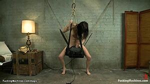 oh man, this busty babe rides the sybian machine squirting hard