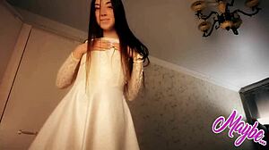 sweet brunette babe undresses white dress fingering pussy to orgasm solo nude