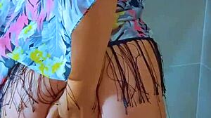Brazilian Beauty Showers Big Ass in Black Thong