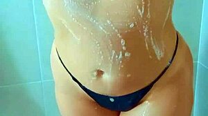 Brazilian Beauty Showers Big Ass in Black Thong