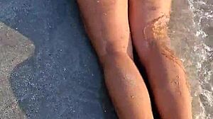 Holy shit beach babe flashes her bikini body publicly!