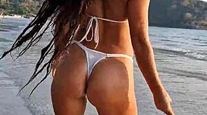 Holy shit beach babe flashes her bikini body publicly!