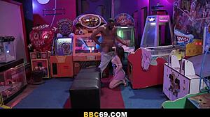 Brunette college girl slurps bbc handjob at arcade hardcore