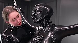 Bound Woman Experiences Intense Vibrator Stimulation in Latex Restraints