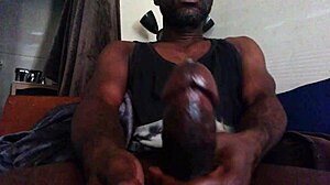 close up black monster cock erupts cum after intense solo masturbation stroke
