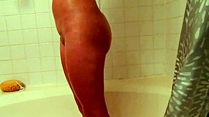 Scarlett Baxter masturbates sensually in steamy shower bath