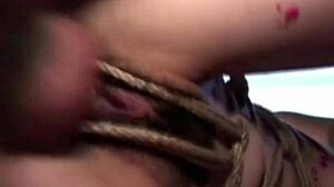 dude japanese babe bound in leather takes candle wax then hardcore fuck