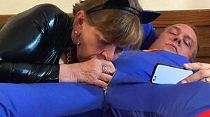 Granny in Cat Costume Deepthroats Superman's Cock Hungrily