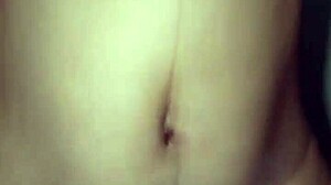 enjoying her beautiful indonesian body with heavy rain outside