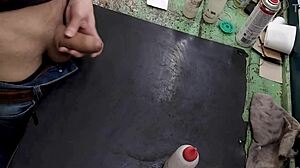 skinny dude sneaks quick monster cock stroke on workbench at work small waist flexin