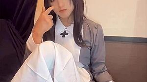 Black-Haired Nurse Ladyboy Masturbates Quietly in Solo Play