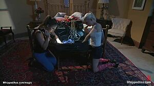 Dominant lezdom whips bound stepmom during intense assfucking