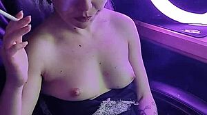 whoa, watch this beautiful lady seductively smoke her cigarette sexy style!