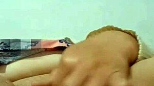 colombian mature housewife stuffs cucumber deep in her bedroom pussy