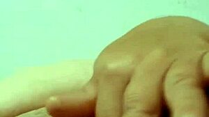 colombian mature housewife stuffs cucumber deep in her bedroom pussy