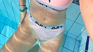 wanna see this horny blonde finger her wet pussy publicly in pool??