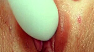 pink pussy lips drip as she masturbates close up