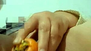 colombian mature housewife stuffs cucumber deep in her bedroom pussy