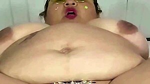 bbw gulps down thick milk from huge fat tits