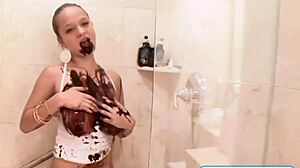 chocolate drips off this petite teen's big tits in shower tease