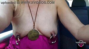 kinky milf flashes pierced nipples pussy ass public street