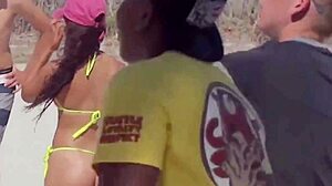 micro bikini hides young girl's huge ass as boyfriend's relatives watch on beach