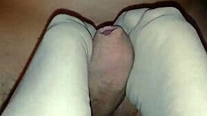 she gives me a homemade nylon footjob ending in sticky cumshot