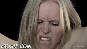 Tied up blonde tits teased with toys in bondage play